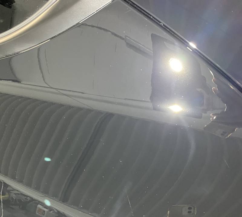 Traitement céramique intégrale de la carrosserie et du pare-brise sur cette Tesla Model Y à Lyon