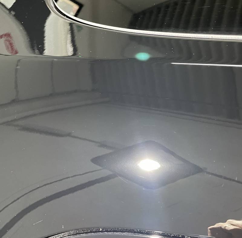 Traitement céramique intégrale de la carrosserie et du pare-brise sur cette Tesla Model Y à Lyon
