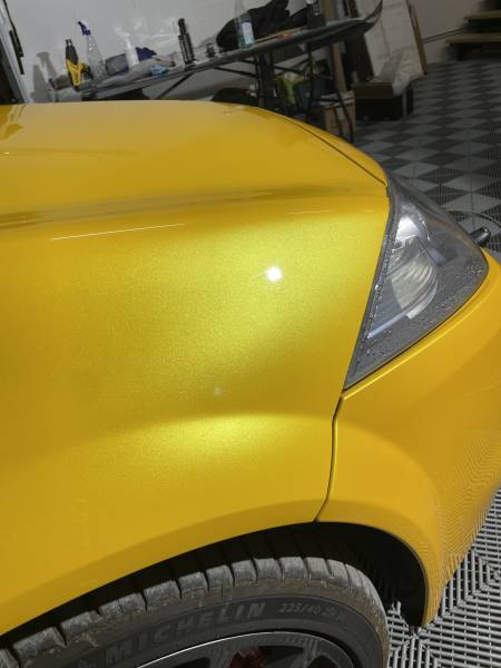 Traitement céramique carrosserie et jantes sur Megane RS F1 Team à Fleurieu-sur-Saône