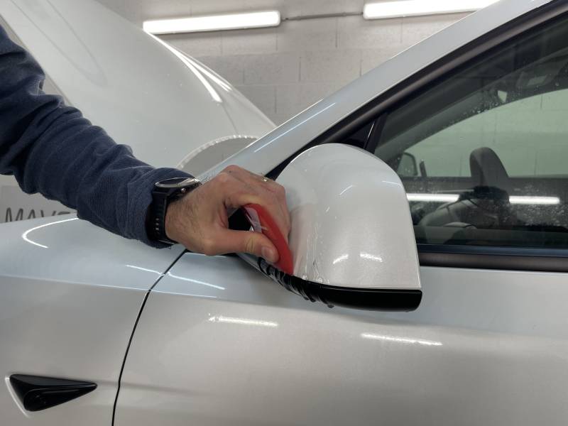 Protection carrosserie par un PPF complet pour Tesla Model Y blanc à Lyon