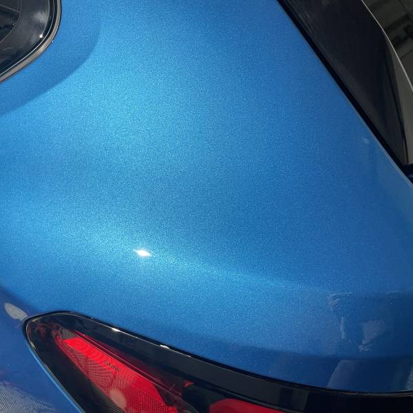 Résultat après correction du vernis avant la pose du film PPF intégral sur BMW M550 G31 à Lyon